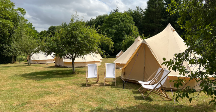 tent with deck chairs